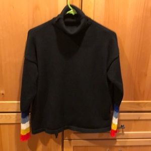 Black turtleneck with stripes on sleeves.  Size M/L.  From Anthropology.